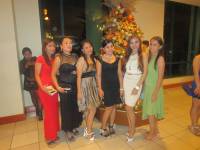 During christmas party, beautiful girls with their best outfits. 