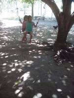 swing swinging kiddos playing
