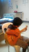lil bro learning to play guitar