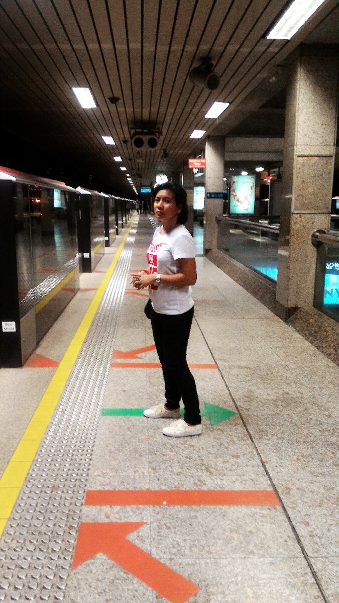 while waiting for the MRT going to Yew Tee