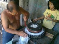antique rice grinder