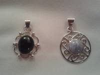 black jade and lilac jade pendants from guatemala