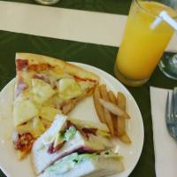 Hawaiian pizza, fries , orange juice