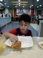 Grandmother and grandson at Chowking