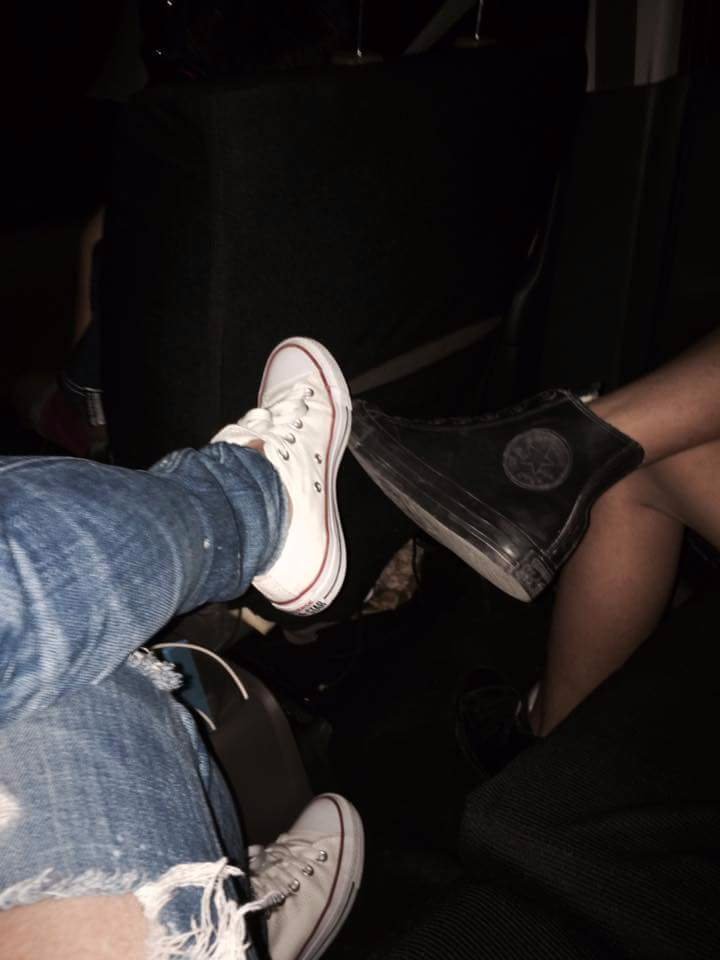 Ripped pants, white shoes