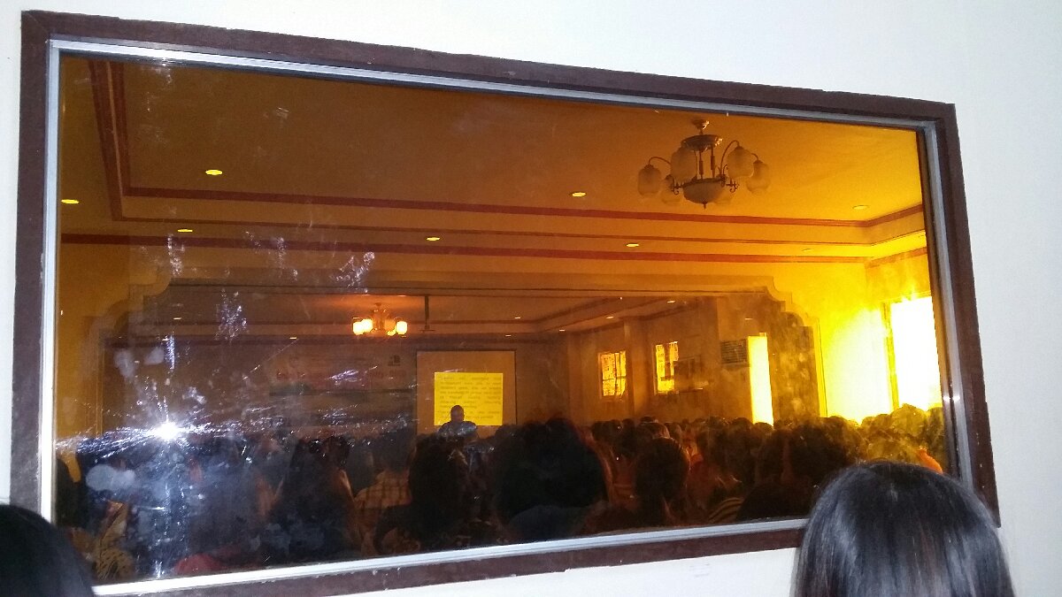 a picture frame or one way mirror