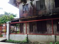 bright red gate by the road