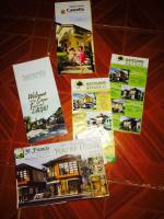 a bunch of real estate brochures i collected