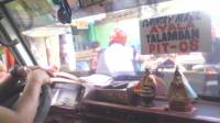 Jeepney, frontseats view, going to school, took this photo because I am bored out of tha traffic jam