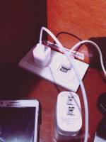 cellphone, books, charger, laptop