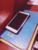cellphone, books, charger, laptop