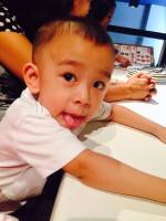 cutie loves baby gaven wearing black shirt black shoes