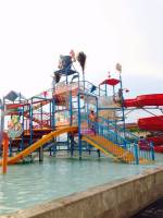 girl, sitting, busy, texting, at sky water park