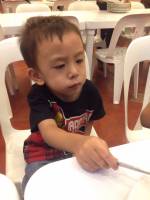 cutie loves baby gaven wearing black shirt black shoes