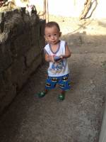 baby gaven, busy texting, batman shirt and shorts