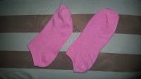 A pair of pink socks