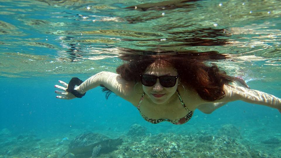wearing shades underwater seems like a peculiar idea