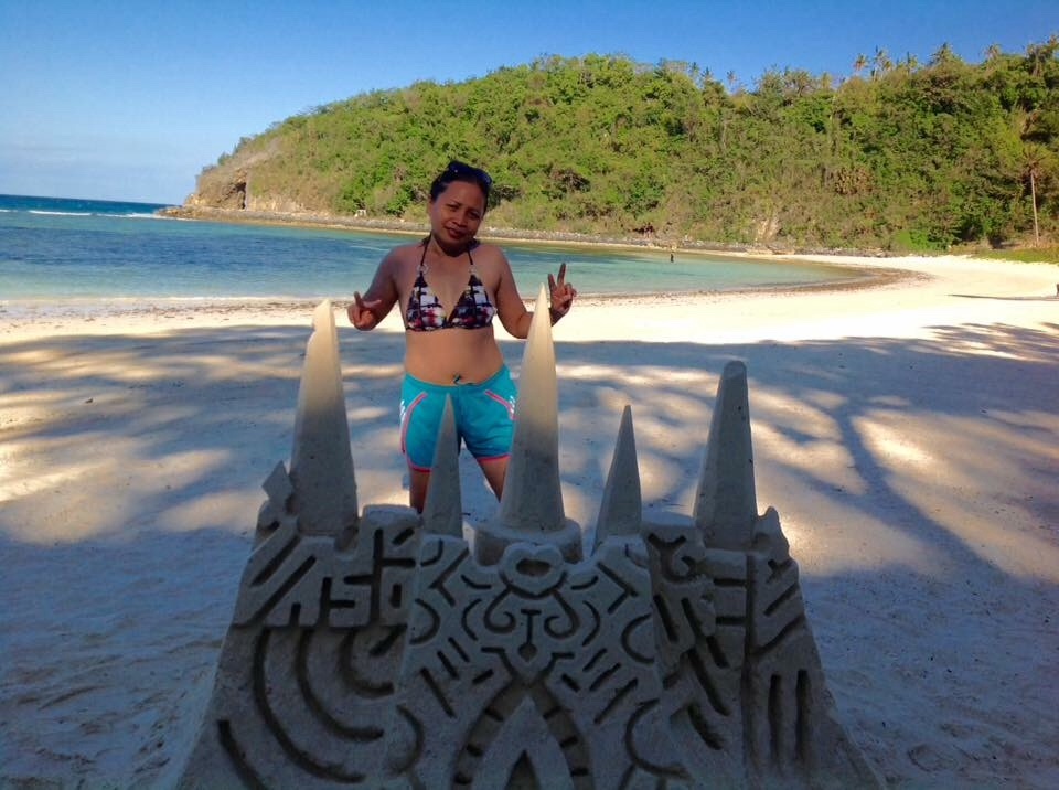 Mommy with the sand palace. Amazing creation
