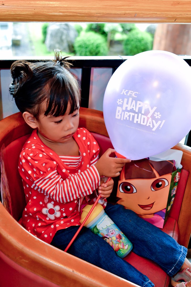 Little sis with favorite cartoon character