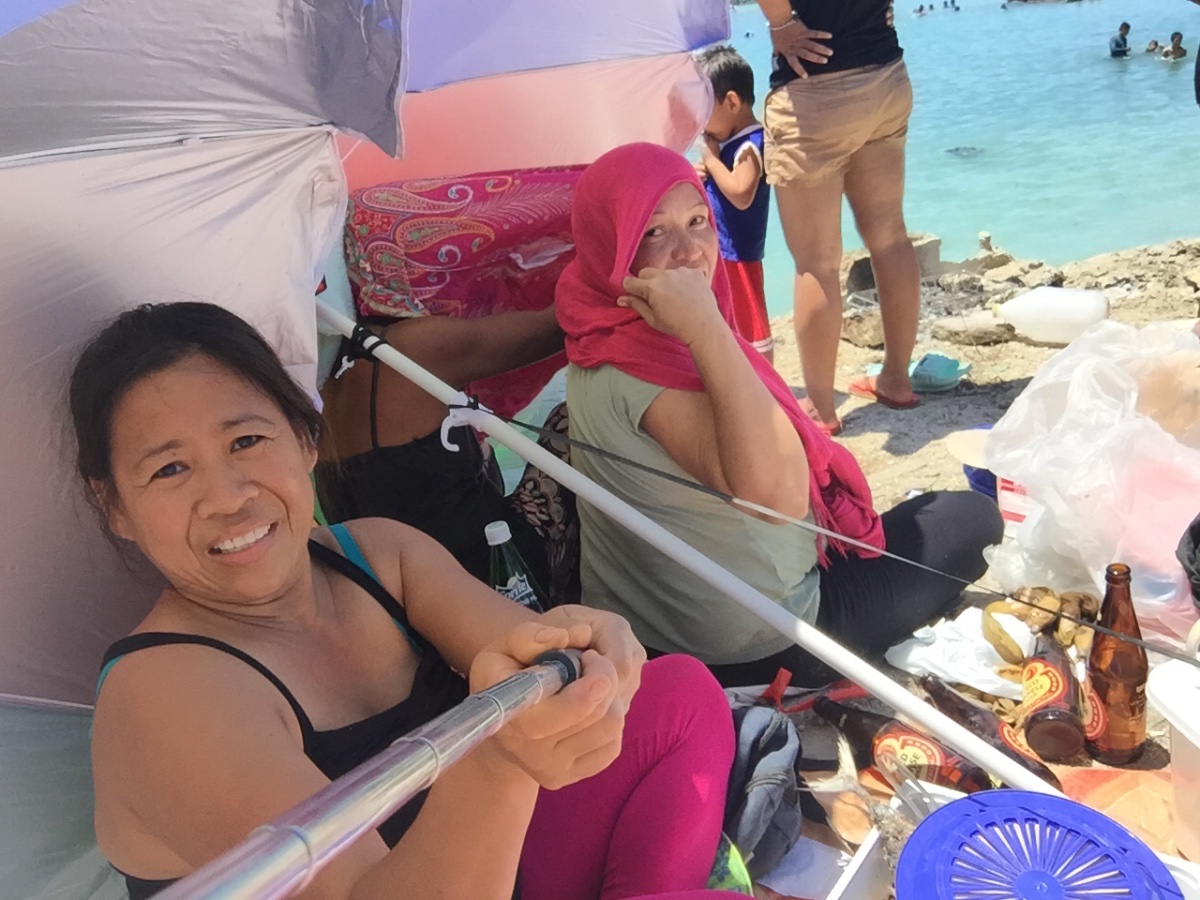 Super hot at the beach with my boyfie’s mama and family