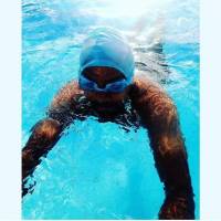 tito practicing swimming for competition