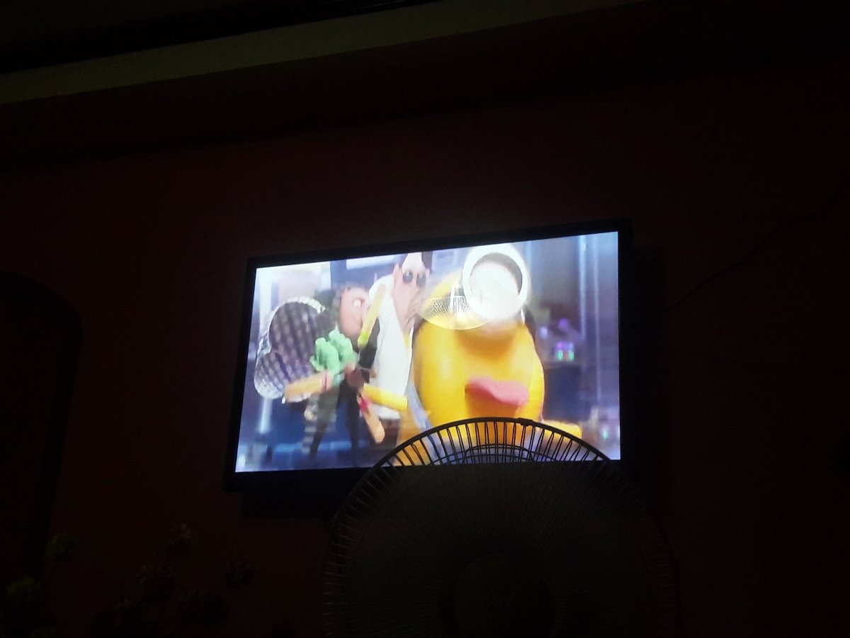 watching movie, despicable me 3, at house