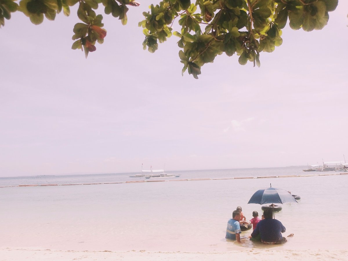 Under umbrella in the sea