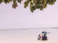 Under umbrella in the sea