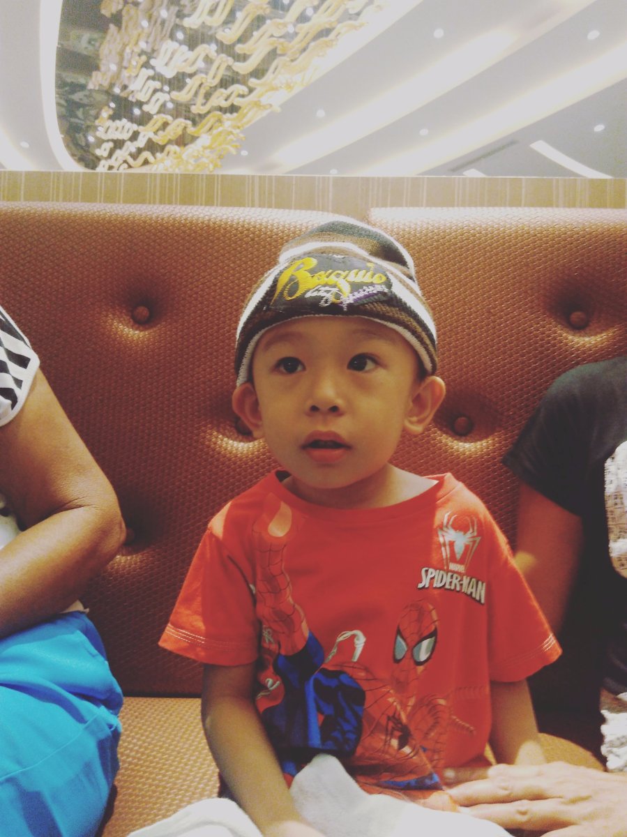 Baby gaven wearing bonnet