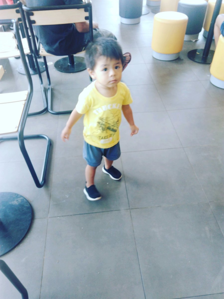 Cutie little bambam baby in yellow