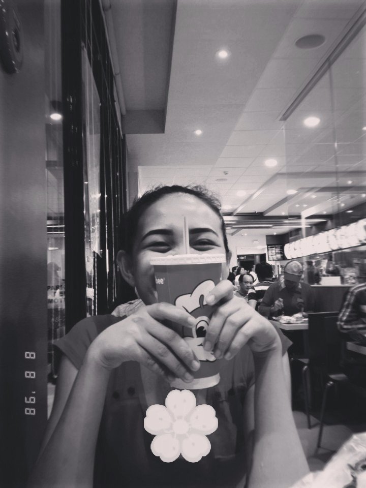 Too sad to cry so she smiled, at jollibee