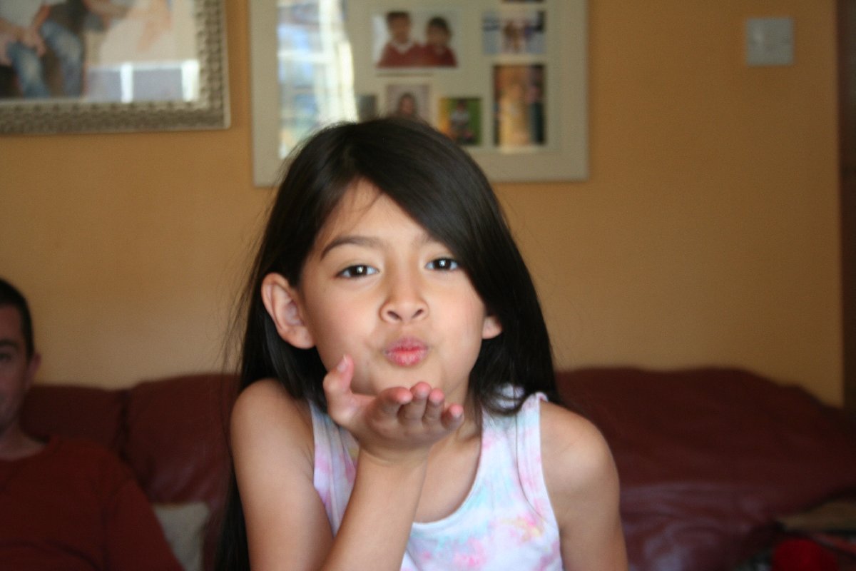 Blowing papa a kiss