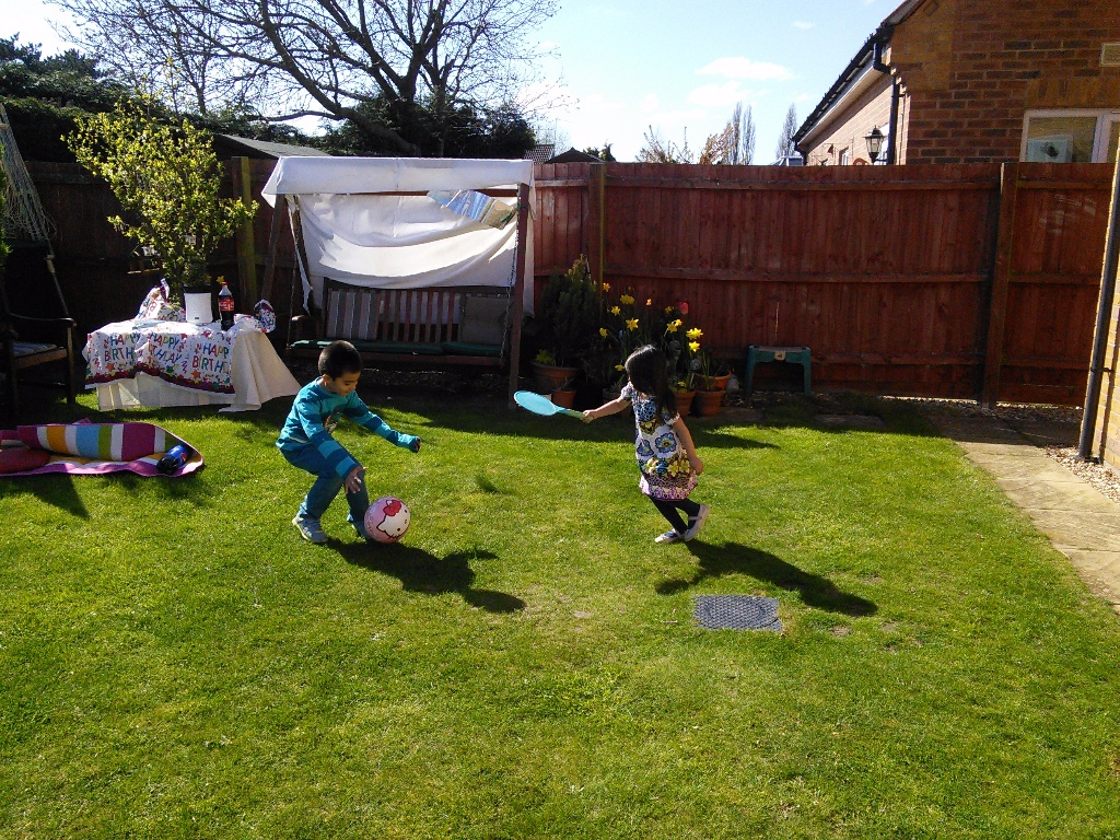 kids playing on a sunnyn day, fun time, sunny england, enjoying the weather