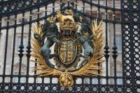 Plaque on gates at Buckingham Palace, Buckingham Palace, London, England, UK