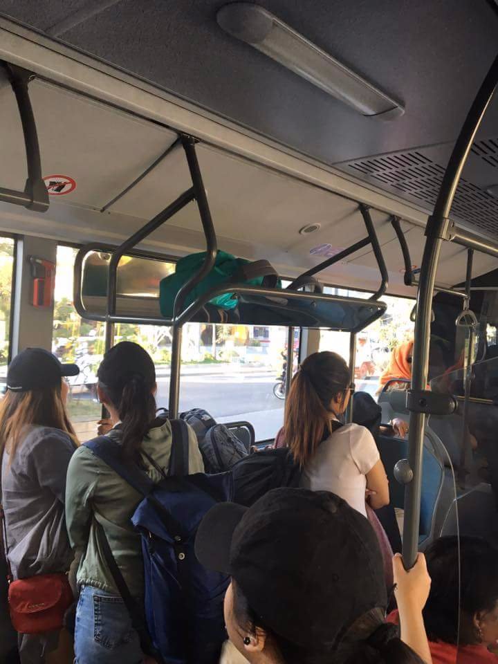 Riding a bus to airport