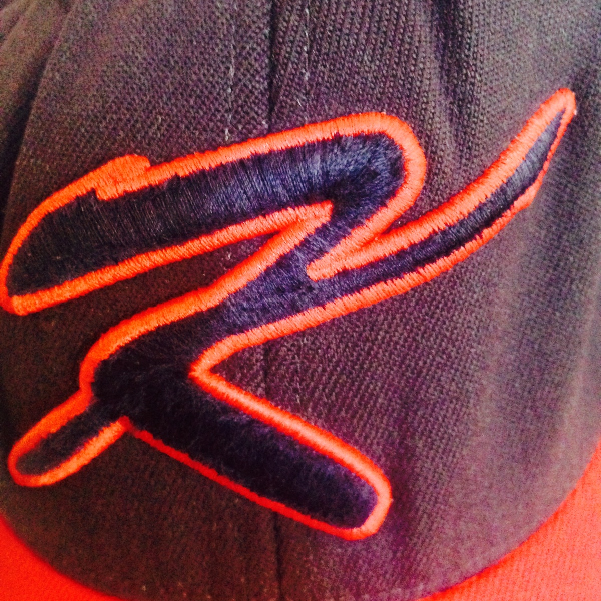 Cap, letter K
