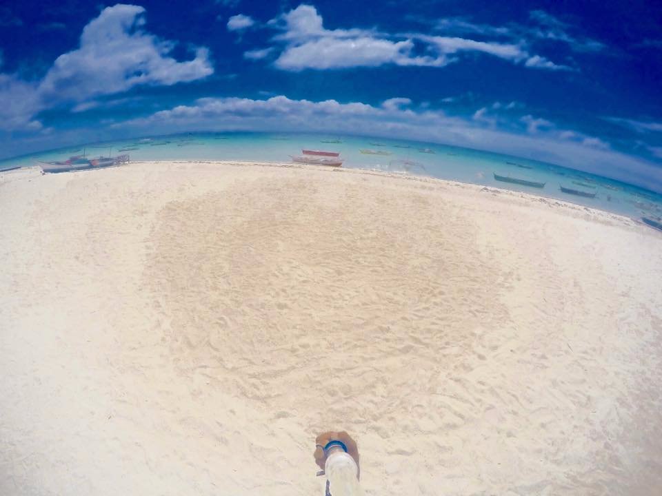 white sands blue skies white clouds