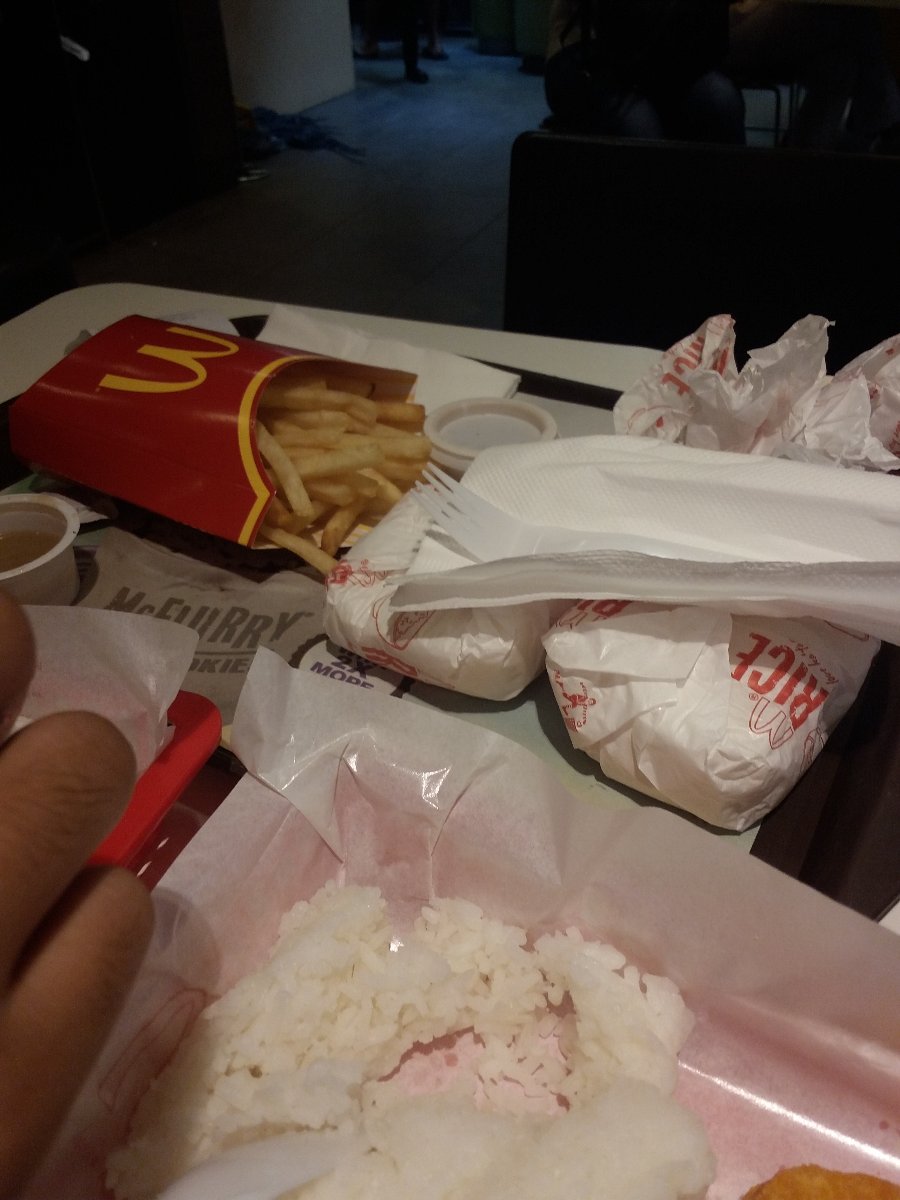 Mc donalds , chicken fillet, large fries , value meal , pineapple drink