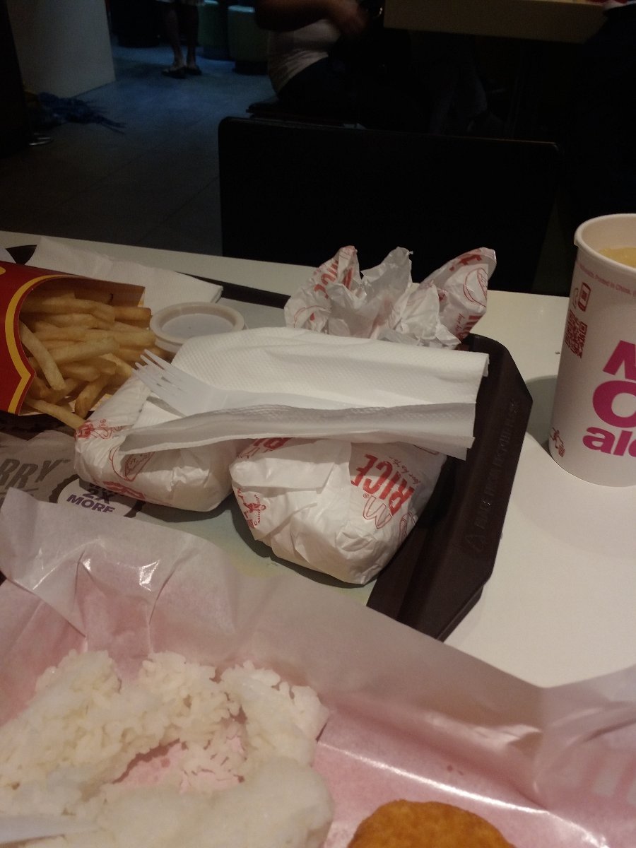 Mc donalds , chicken fillet, large fries , value meal , pineapple drink