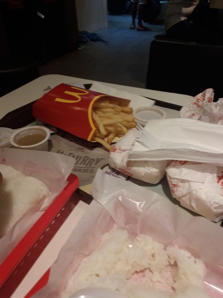 Mc donalds , chicken fillet, large fries , value meal , pineapple drink