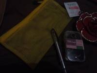 Ponds, wallet, pen , case, rubber band