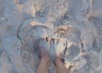 feet in the sand