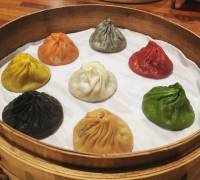 8 types of xiao long bao in one bamboo steamer. Totally gunning for the truffle black one 