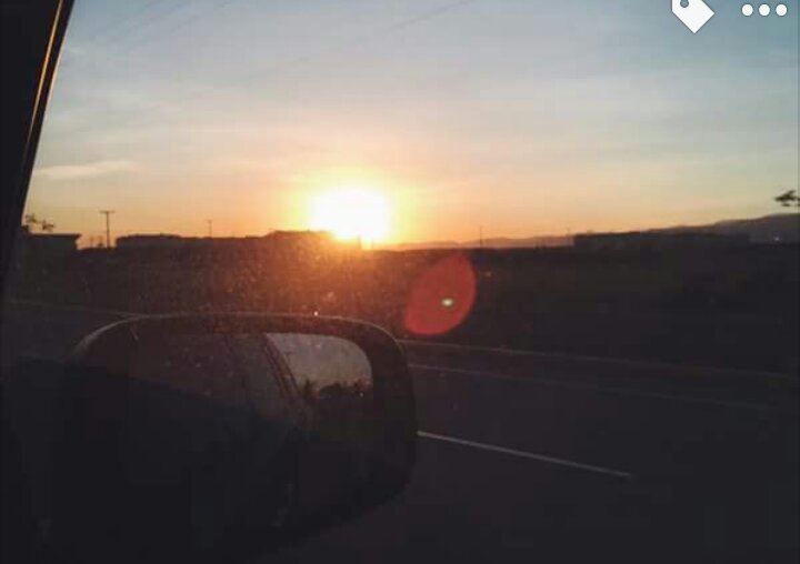 sunset in the road