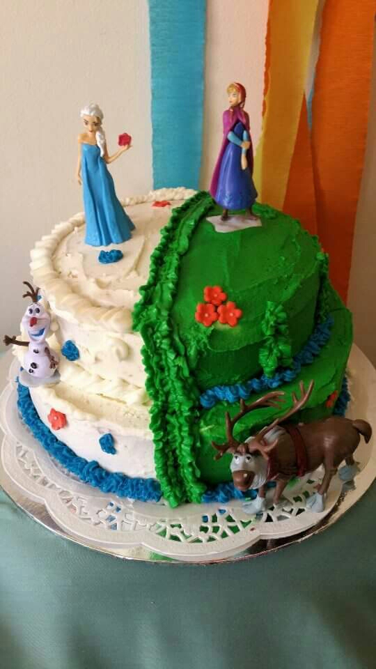 Frozen inspired cake victoria and marble sponge cake made by my sister yummy