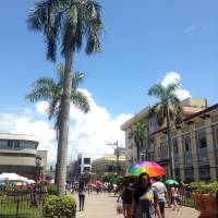 Walking under the heat of the sun, sweating, On the way to Basilica Del Sto. Nino