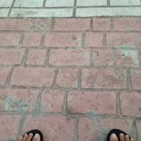 Feet, floor, bricks