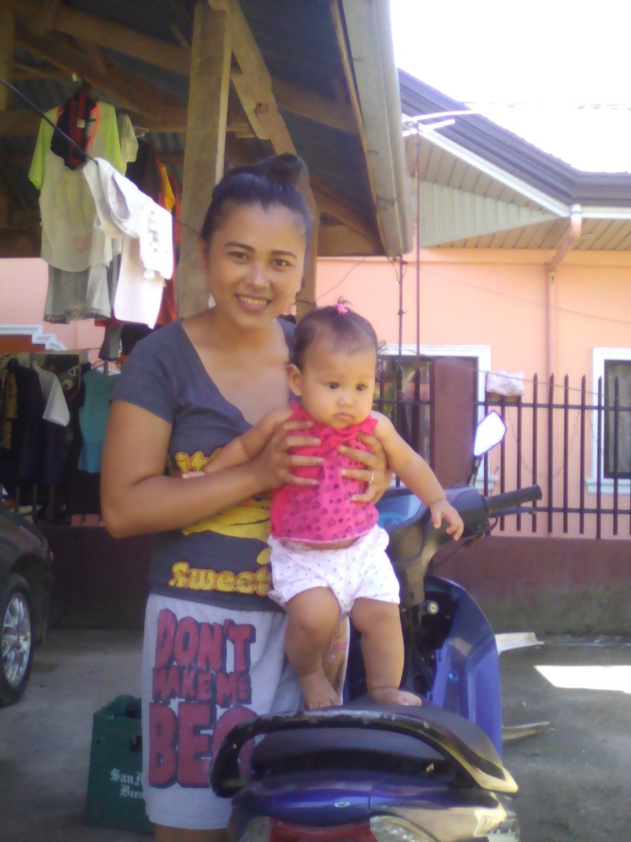 mother  daughter on motorcycle