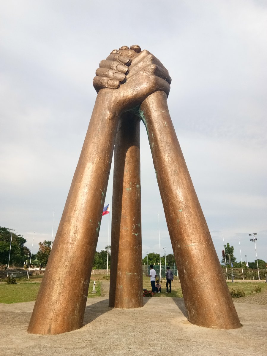 Giant Three Holding Hands