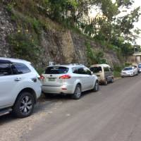 Cars by the road